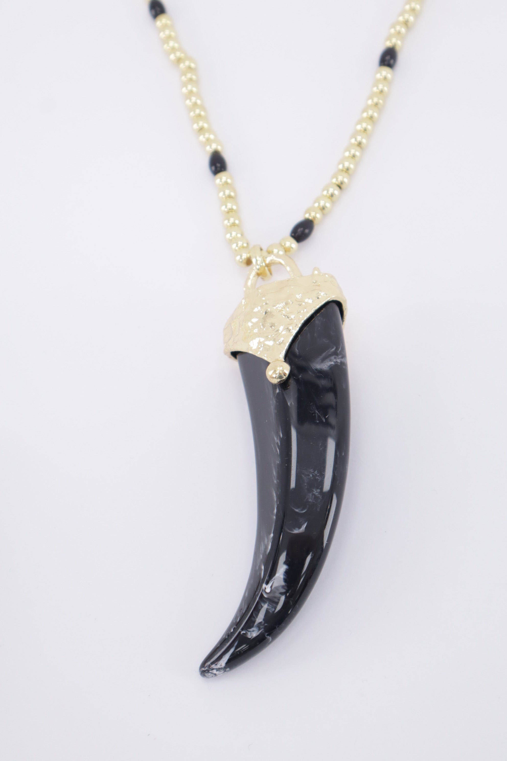 Collar cuerno ultimo