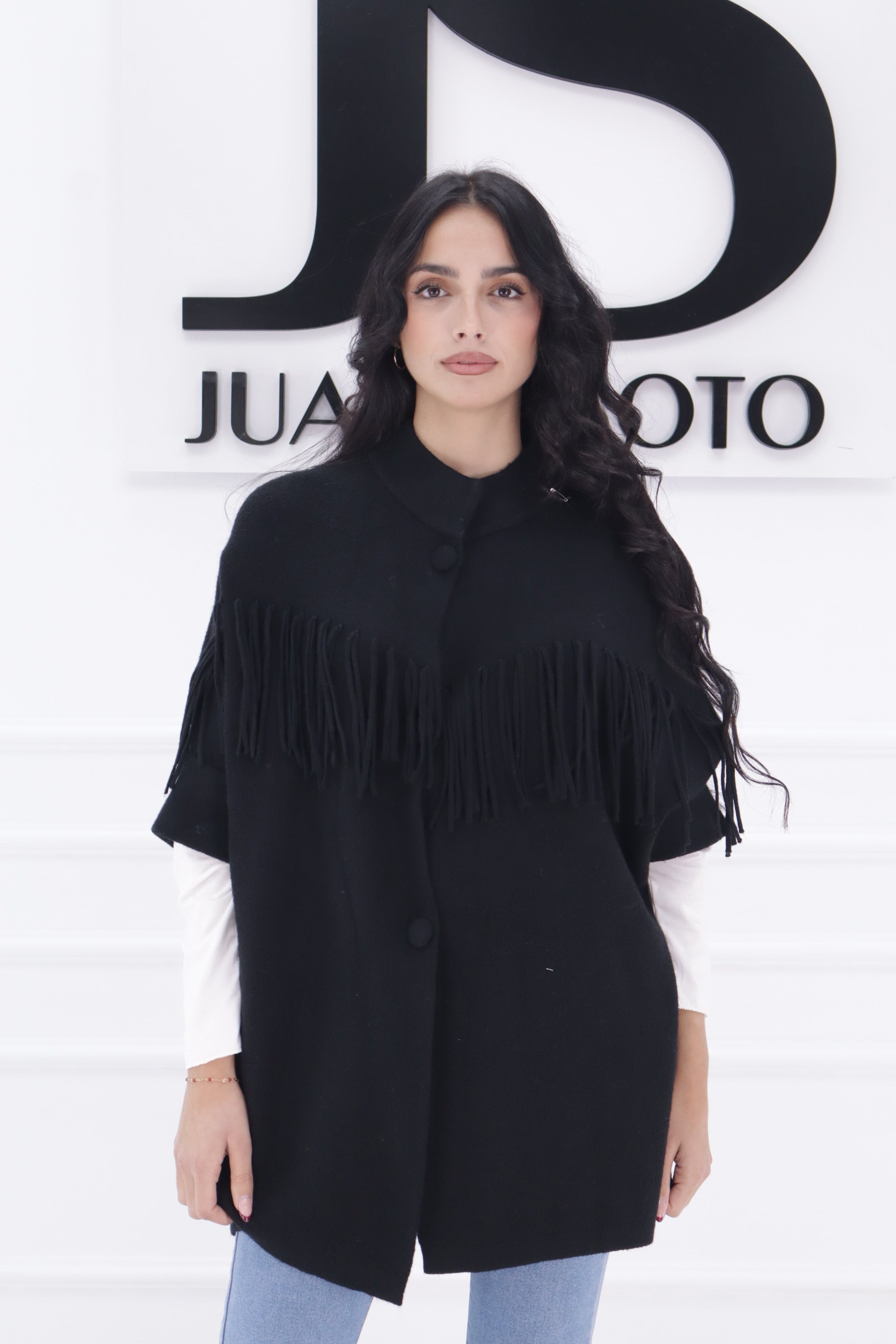 Poncho flecos botones 5101