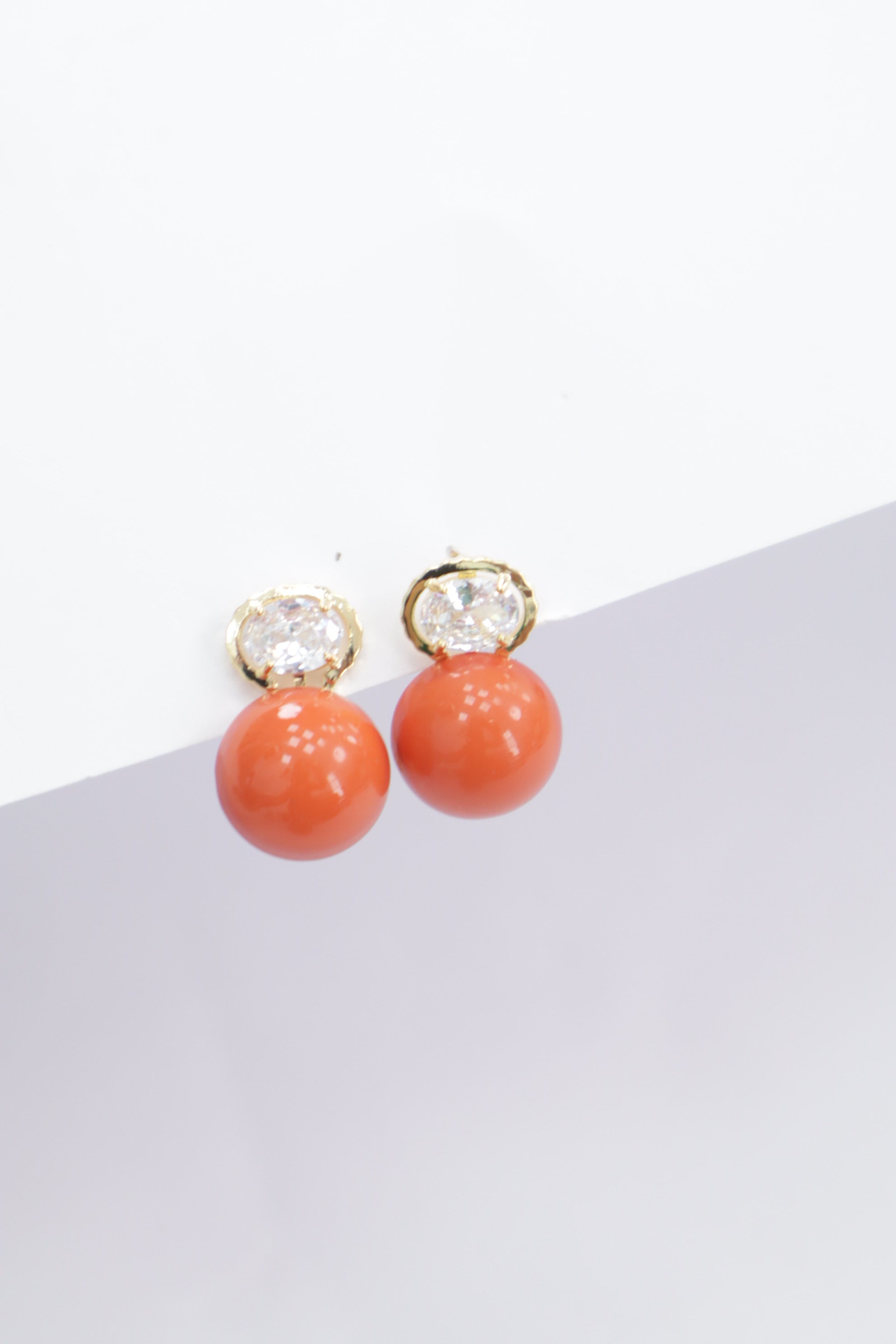 Pendiente acero perla + diamante cierre omega